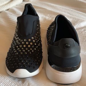 michael kors // black studded slip on tennis shoes